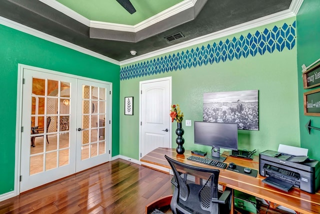 office space with visible vents, ornamental molding, wood finished floors, french doors, and baseboards