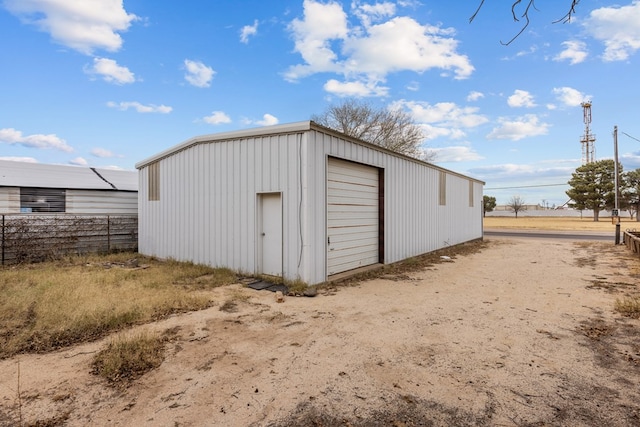 view of outdoor structure with a garage