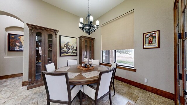 dining area with a notable chandelier