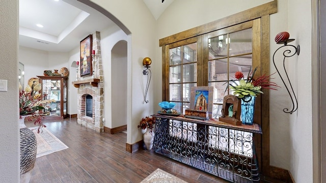 corridor with dark hardwood / wood-style floors