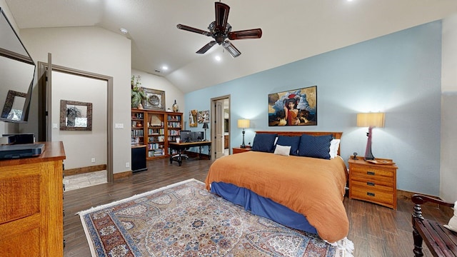 bedroom with vaulted ceiling, dark wood-type flooring, and ceiling fan