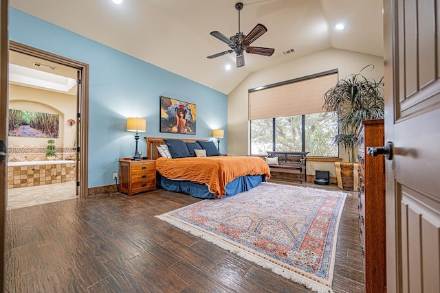 bedroom featuring ensuite bath, vaulted ceiling, dark hardwood / wood-style floors, and ceiling fan