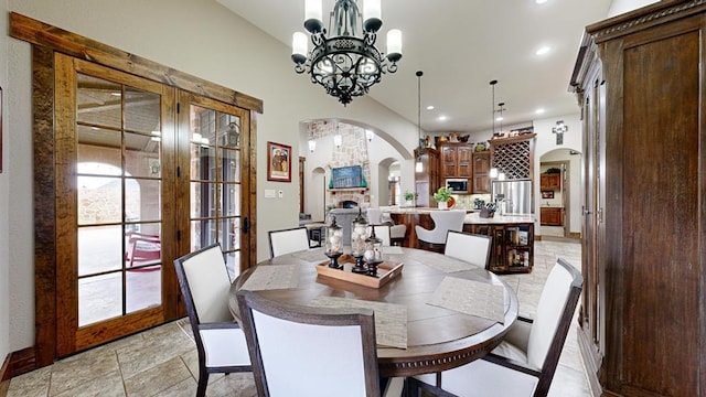 dining area featuring a notable chandelier