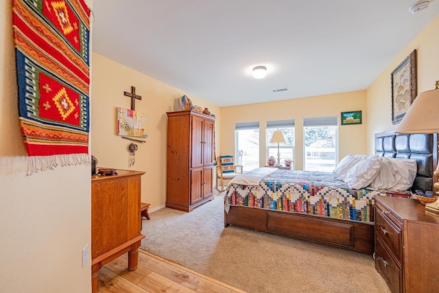 bedroom featuring light wood-type flooring