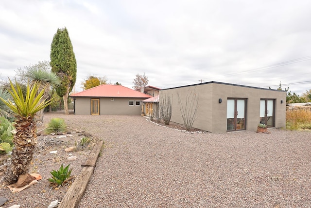 back of house with french doors