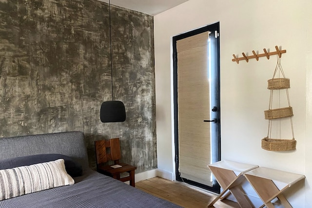 bedroom featuring wood-type flooring