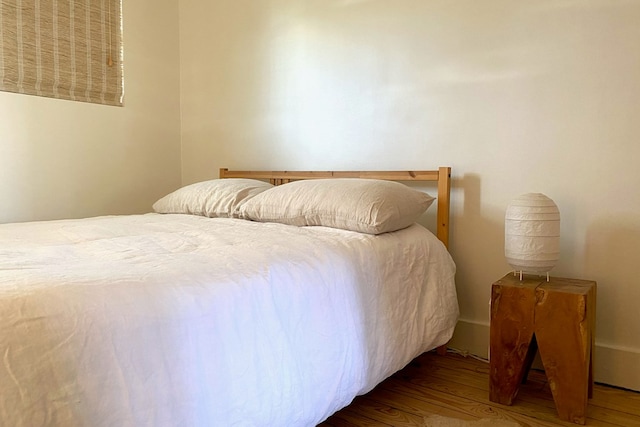 bedroom featuring hardwood / wood-style floors