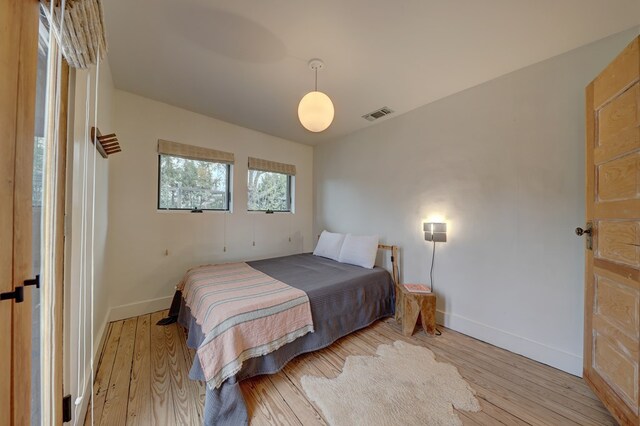 bedroom featuring light wood-type flooring