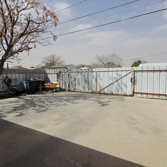 view of patio / terrace with a gate and fence