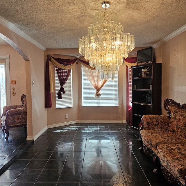 dining space featuring arched walkways, a textured ceiling, baseboards, and crown molding