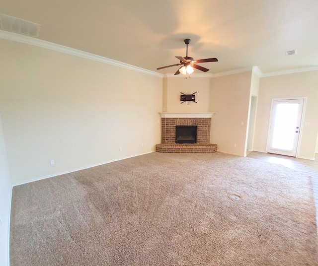 unfurnished living room with visible vents, a ceiling fan, and crown molding