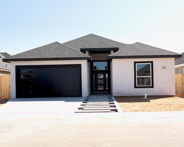 prairie-style house with a garage