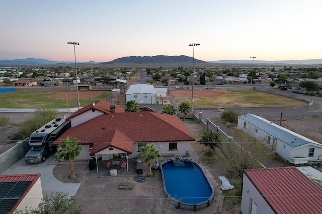 aerial view at dusk with a mountain view