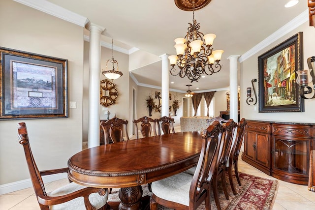 tiled dining area featuring a notable chandelier, crown molding, and decorative columns