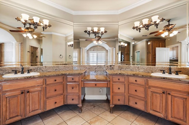 bathroom featuring vanity, a shower, tile patterned floors, and ornamental molding