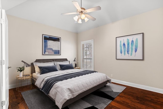 bedroom featuring ceiling fan and dark wood-type flooring