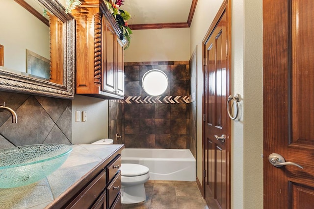 full bathroom featuring toilet, vanity, tasteful backsplash, tile patterned floors, and crown molding