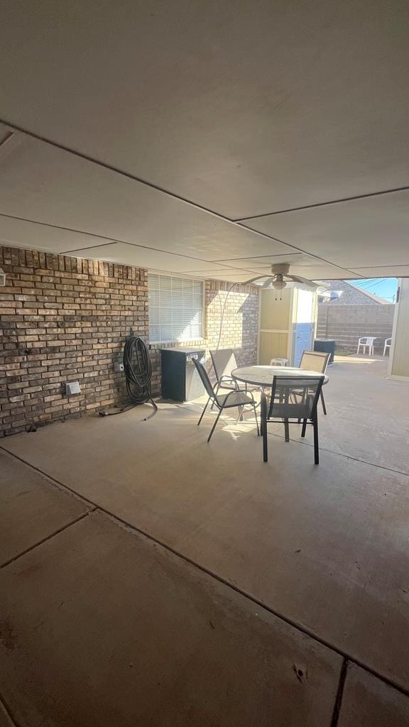 view of patio featuring ceiling fan