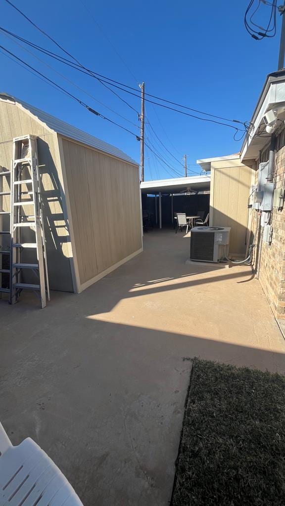 view of patio featuring cooling unit