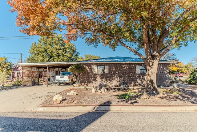 view of front of house with a carport