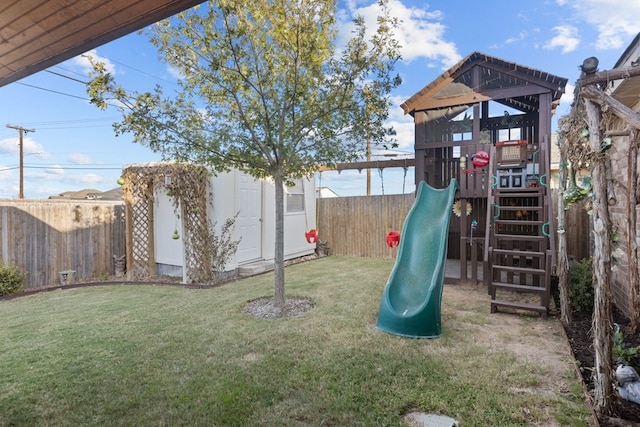 view of play area with a yard