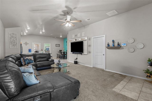 living room featuring visible vents, a ceiling fan, carpet flooring, vaulted ceiling, and baseboards