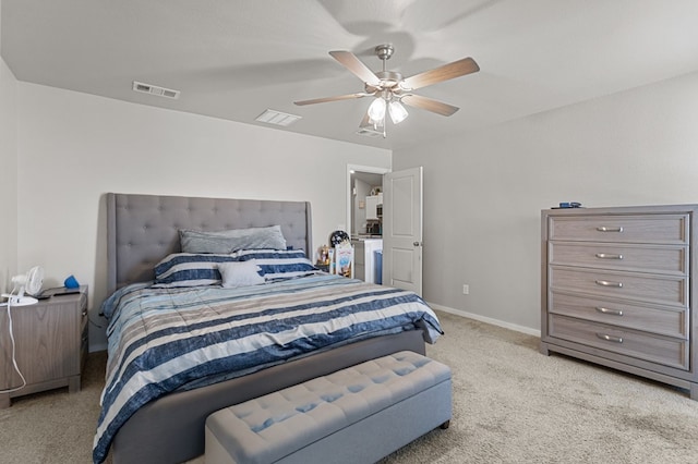 bedroom featuring light carpet, baseboards, visible vents, and ceiling fan