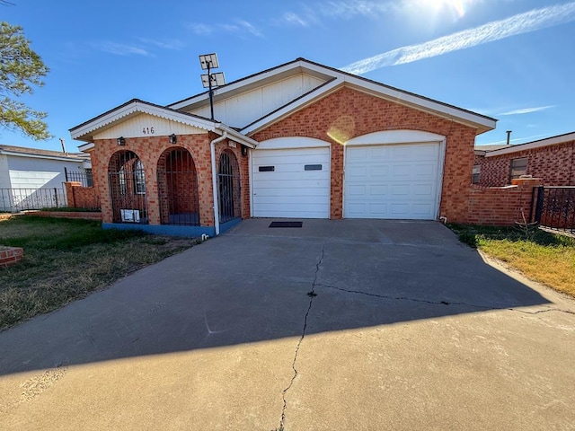 view of front of property featuring a garage