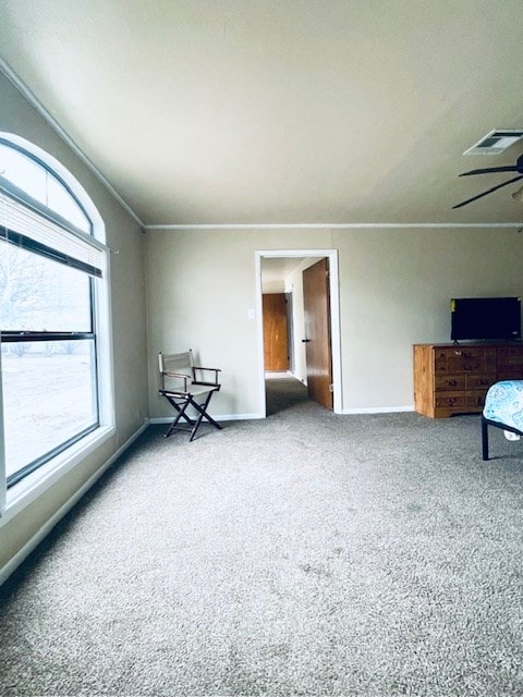 carpeted bedroom with crown molding