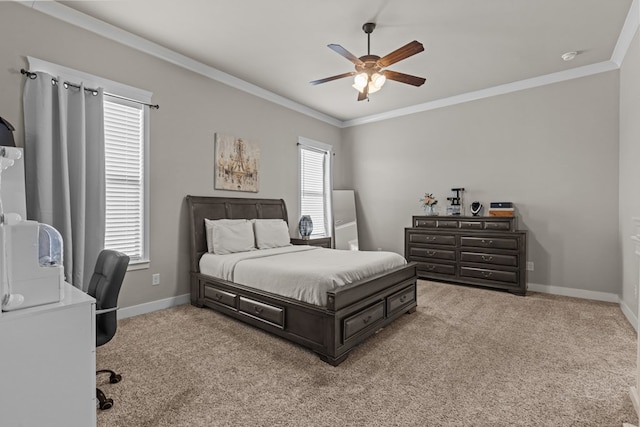 bedroom with baseboards, crown molding, and light colored carpet