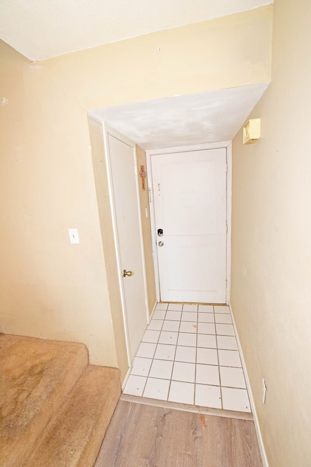 corridor featuring light hardwood / wood-style floors