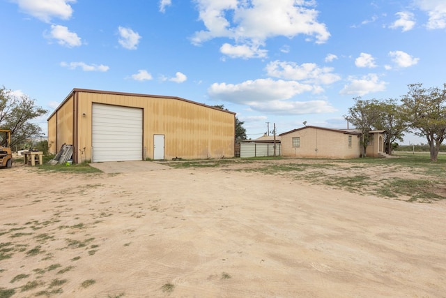 view of outbuilding featuring a garage