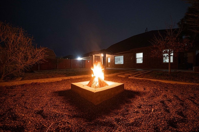 view of yard at twilight