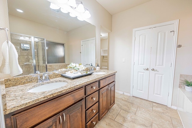 bathroom featuring vanity and walk in shower