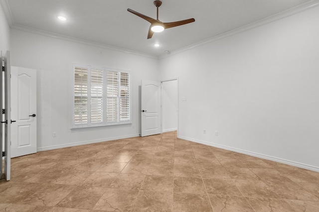 unfurnished room featuring ceiling fan and crown molding