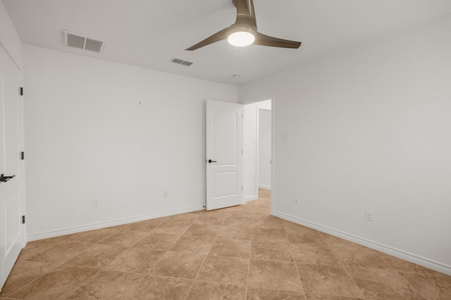 spare room featuring ceiling fan