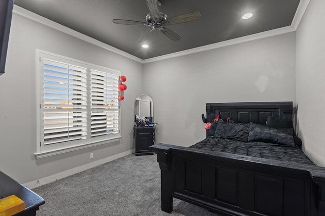 carpeted bedroom featuring ornamental molding and ceiling fan