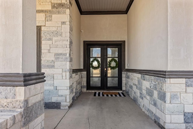 property entrance featuring french doors