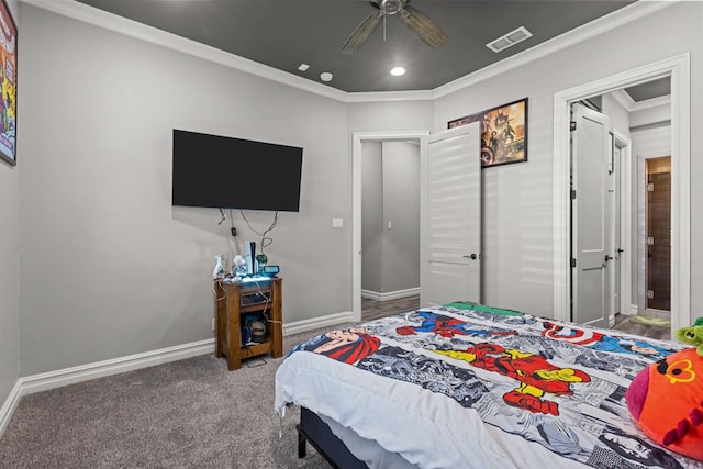 bedroom featuring carpet floors, ornamental molding, and ceiling fan