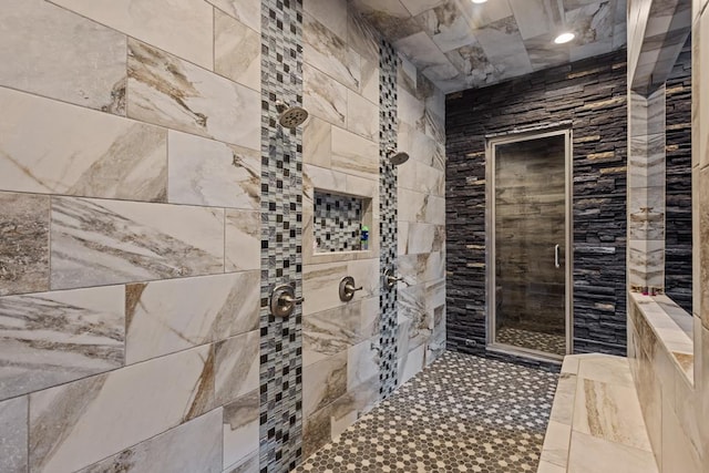 bathroom with tiled shower