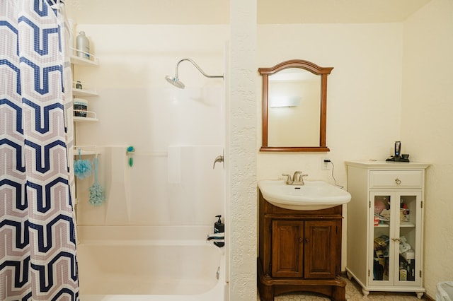 bathroom with shower / bath combination with curtain and vanity