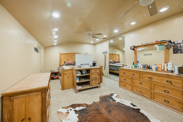 bedroom with light carpet, visible vents, vaulted ceiling, a textured ceiling, and recessed lighting