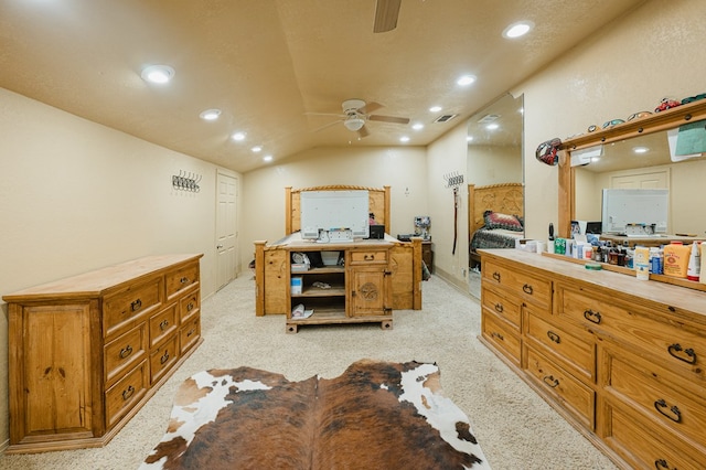 bedroom with vaulted ceiling, light carpet, and recessed lighting