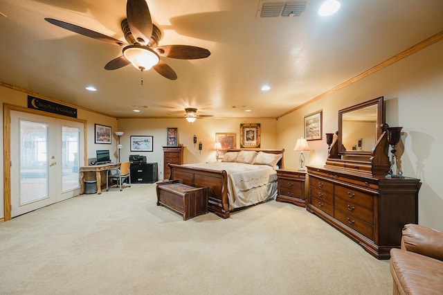 bedroom featuring access to exterior, french doors, visible vents, ornamental molding, and light carpet