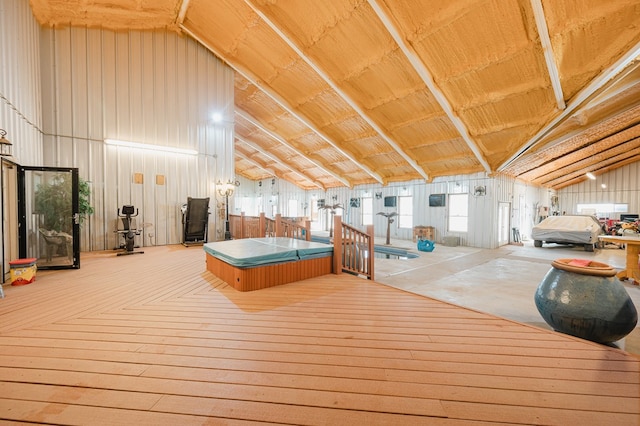 unfurnished bedroom with lofted ceiling