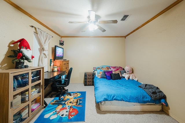 carpeted bedroom featuring a textured ceiling, visible vents, baseboards, a ceiling fan, and ornamental molding