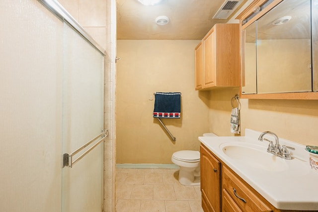 full bathroom with toilet, visible vents, vanity, baseboards, and a stall shower