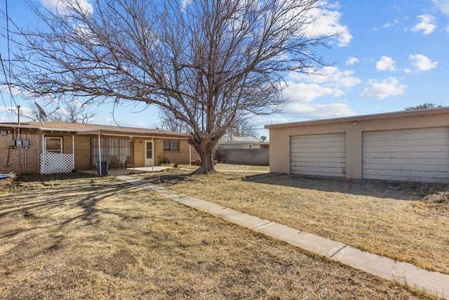 view of yard with a garage