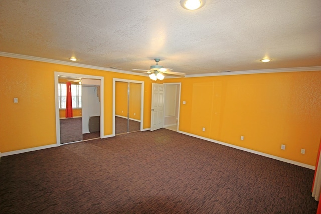 carpeted empty room with crown molding, ceiling fan, and a textured ceiling