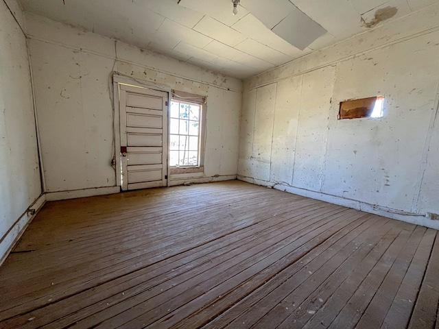 spare room with light hardwood / wood-style flooring